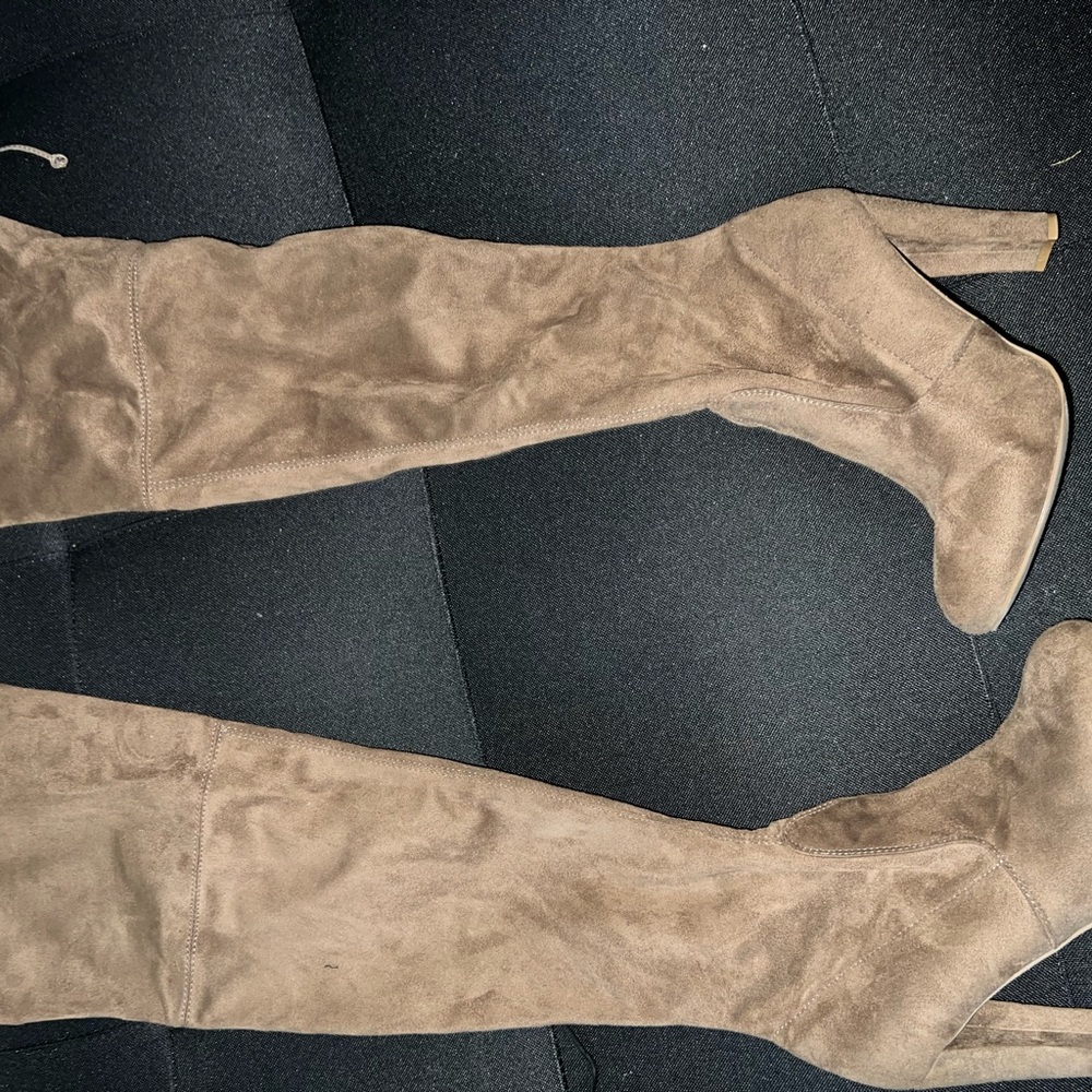 Tan thigh high heeled boots